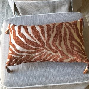 Tiger patterned pillow. Never used. 19” L x 10” W.